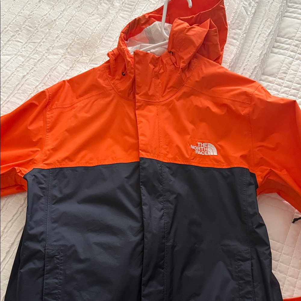 The North Face men’s ' Orange and blue rain Jacket